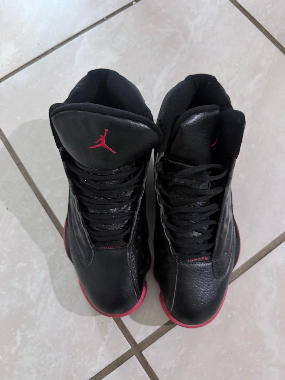 Jordan Men’s Black Sneakers with red Accents